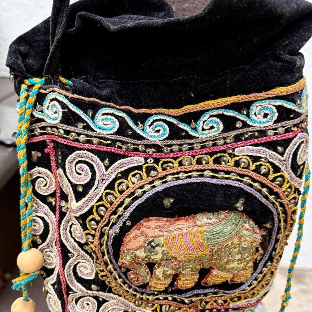 Black velvet purse with elephant